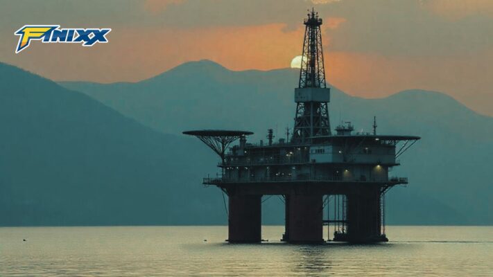 An oil pumpjack operating at dusk, illustrating the topic of global oil production and prices.